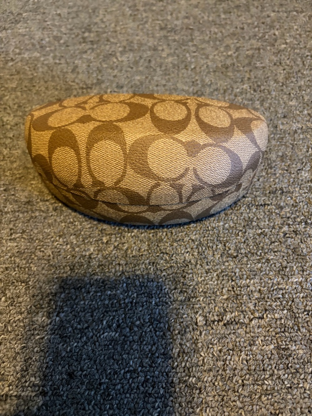 Coach sunglasses case.